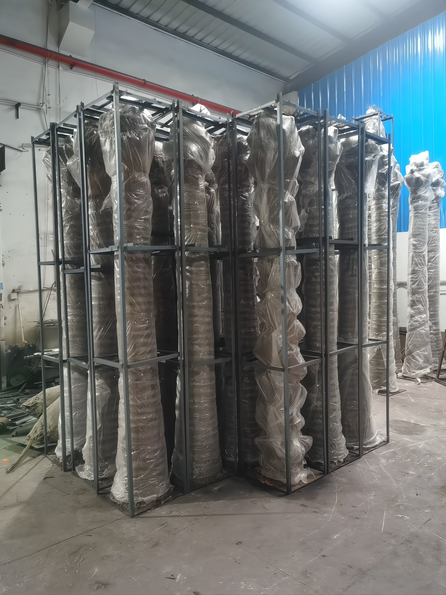 Bubble-wrapped and crated in welded iron frames