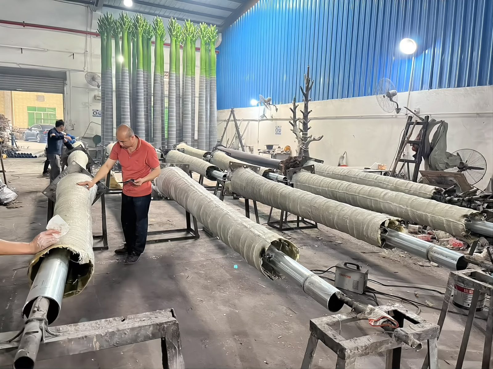 Fibreglass skin laid over the steel core by hand